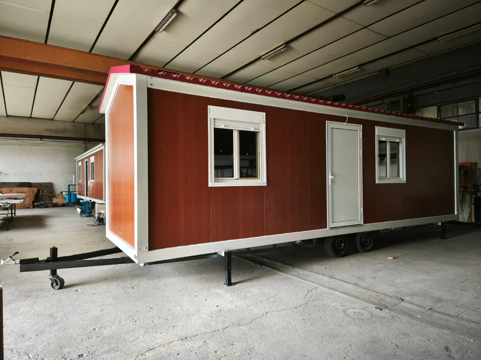 Red wood-look Classic Line with its towing drawbar